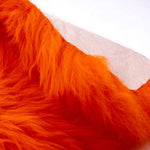 Warm oranje schapenvacht van Texel