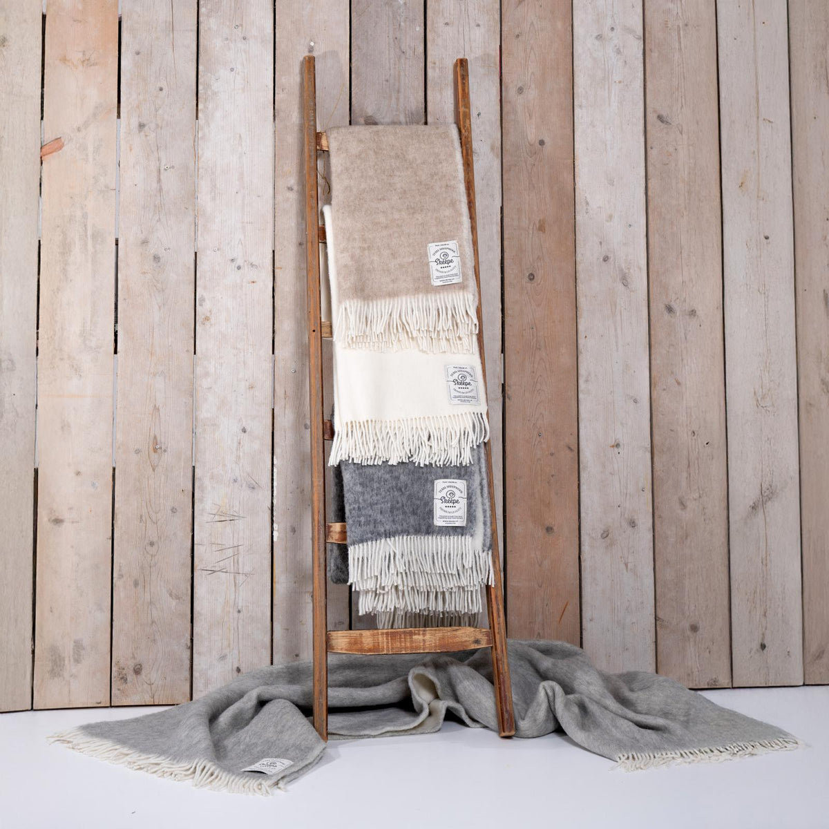 plaid van schapenwol beige grijs en wit