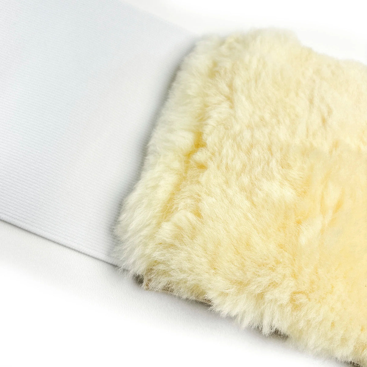 schapenvacht rugwarmer