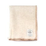 licht beige wollen plaid