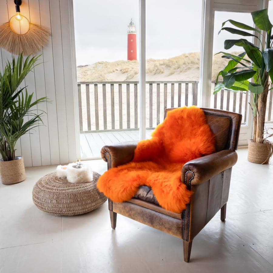 Oranje schapenvacht - Schapenvacht voor in stoel - Texelse schapenvachten